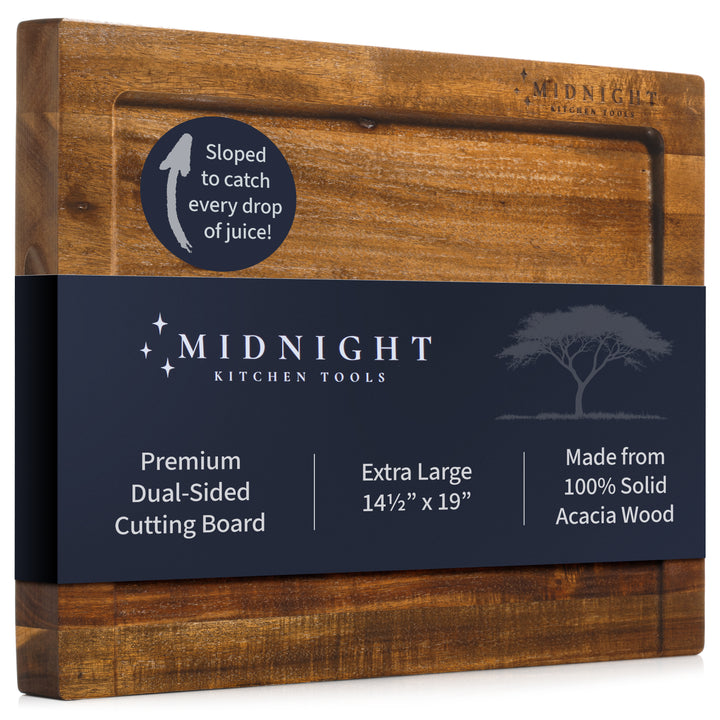 Wooden cutting board with Midnight Kitchen Tools branding on a white background